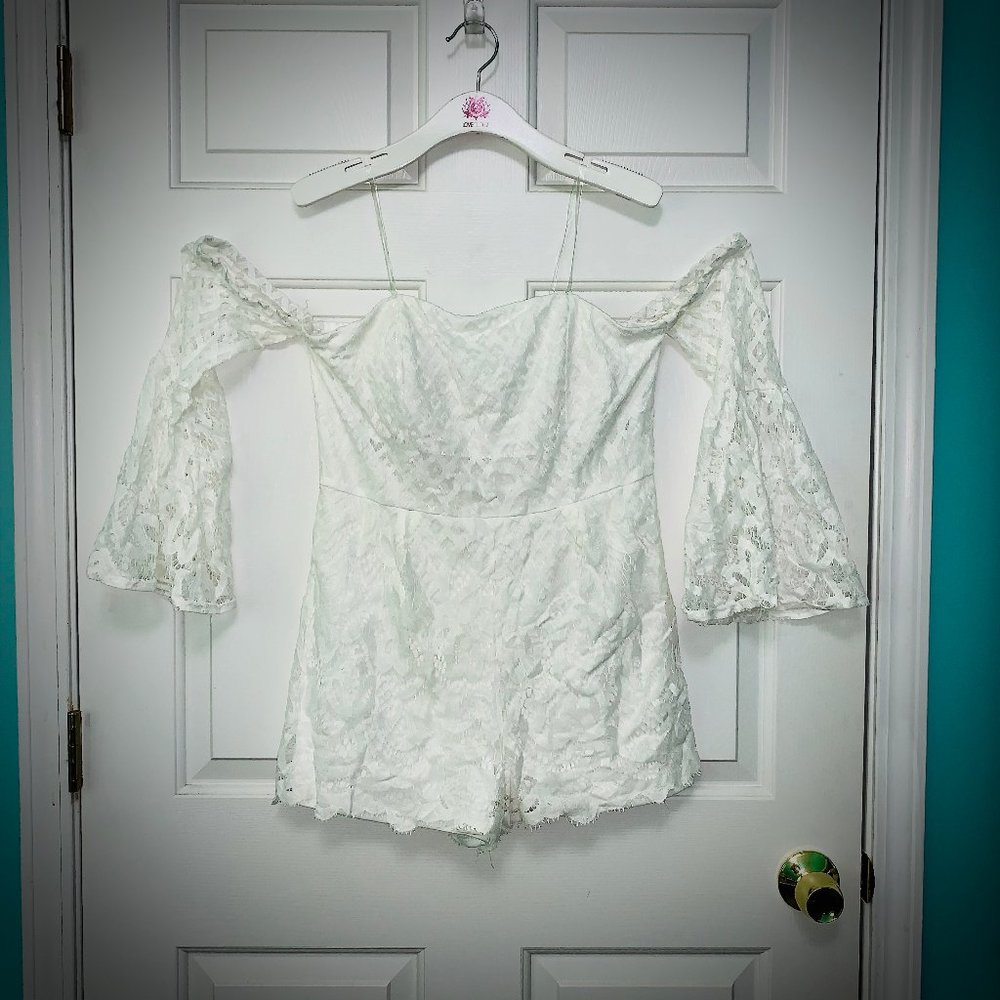Shoulderless Charlotte Russe white lace romper
